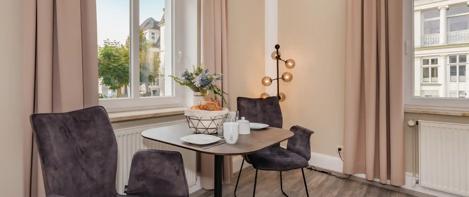 Ferienwohnung Sandburg Villa Carmen Essbereich