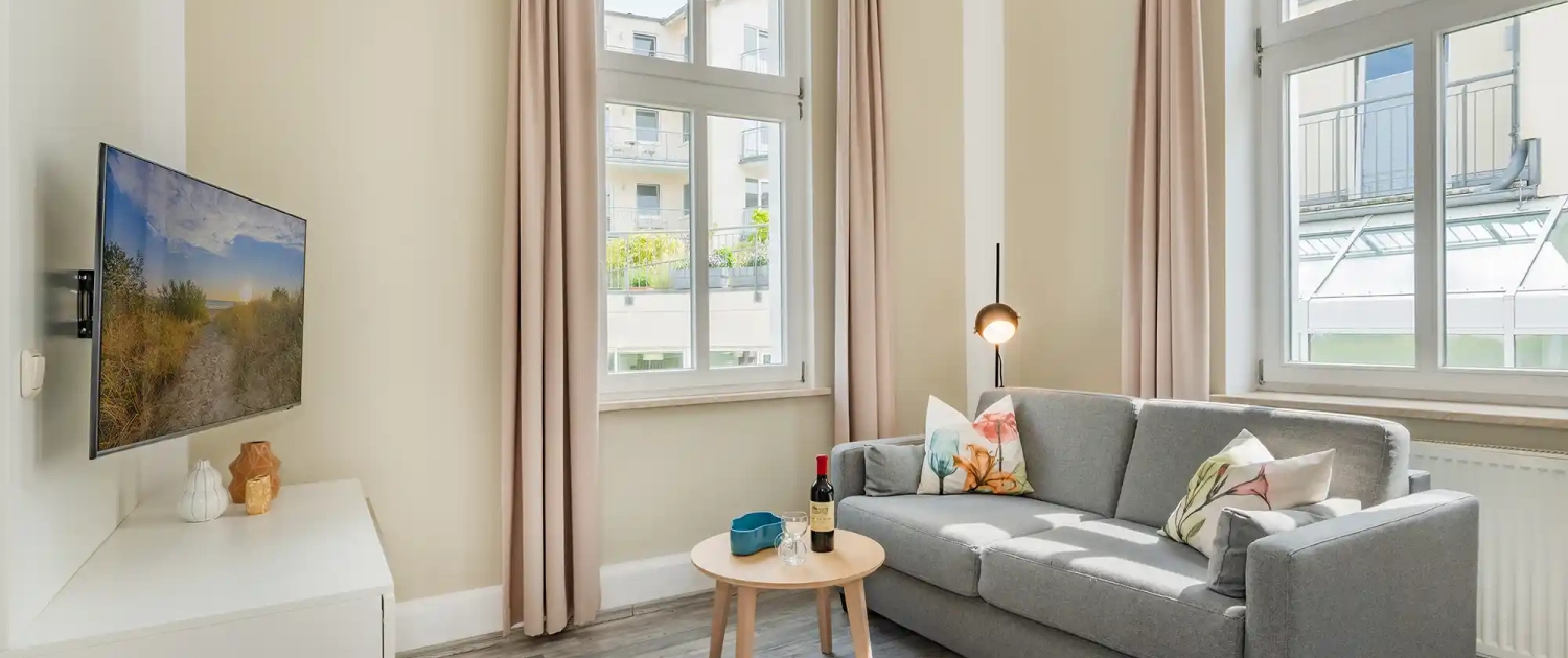Villa Carmen Ferienwohnung Dünengras Wohnzimmer