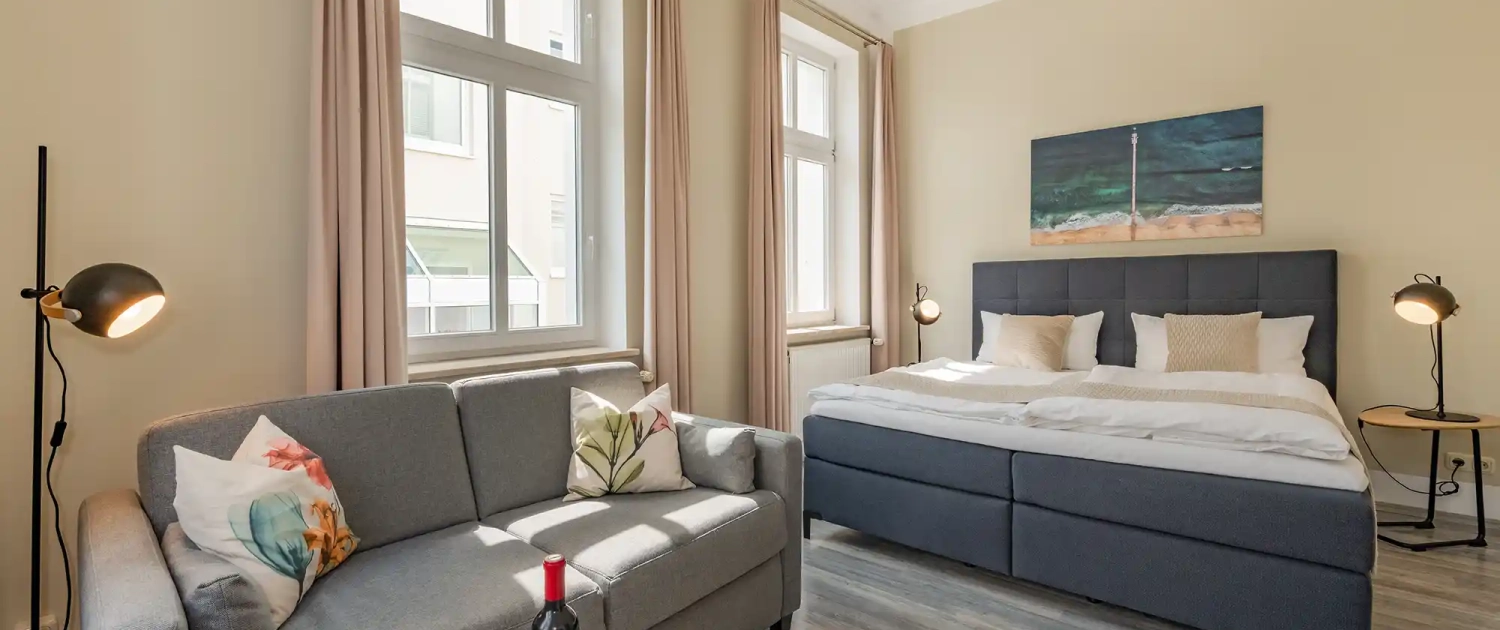 Villa Carmen Ferienwohnung Dünengras Schlafbereich