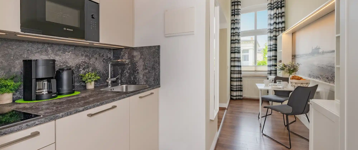 Ferienwohnung Seebrücke Villa Carmen Küche mit Essbereich